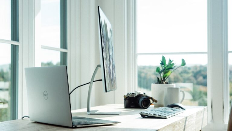 Laptop on stand home office desk