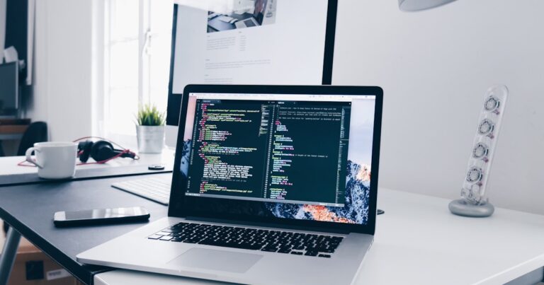 Ultrawide monitor on a coding desk setup